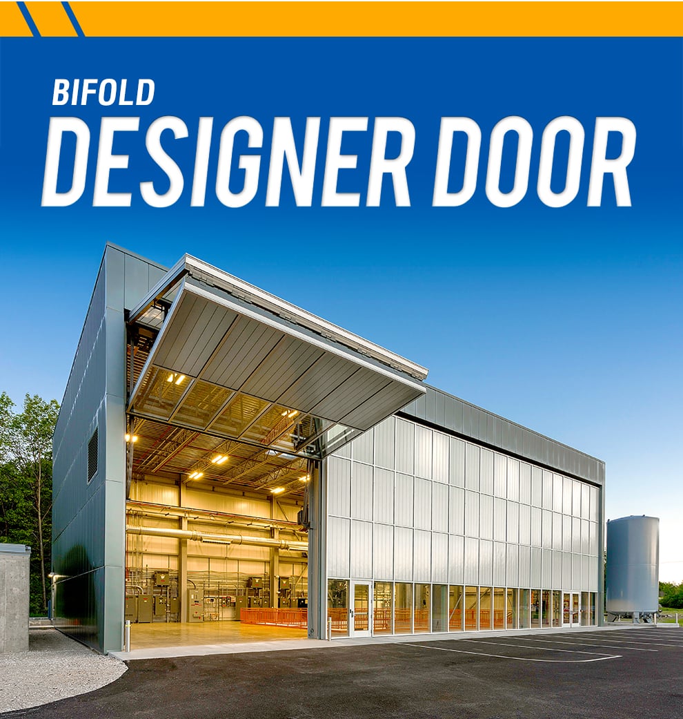 An open designer bifold door on a steel building