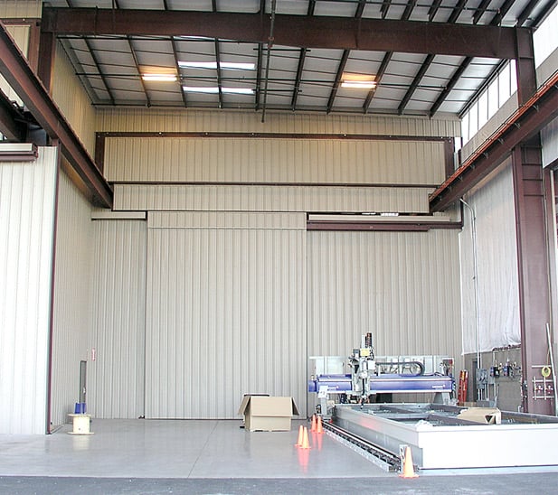 Hydraulic One-Piece door more efficiently opens/closes for cranes saving time and energy