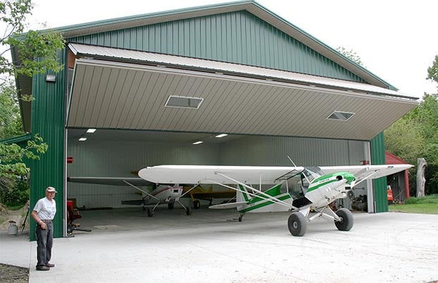 45 foot door gives enough room to wheel in and out planes or farm machinery
