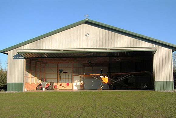 Schweiss bifold door on hangar at personal airstrip