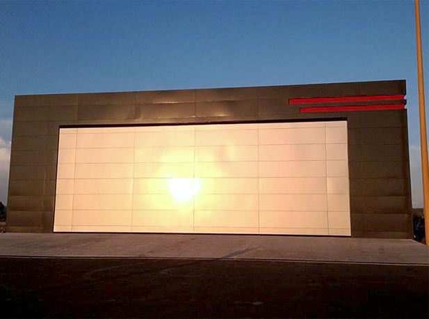 Exterior of Schweiss bifold hangar door shines bright in Mexico 