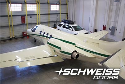 hangar home with a Schweiss Bifold door houses large jet and still has more room