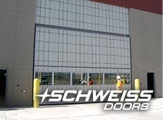 Schweiss Doors were clad in translucent panels that hold up to terrorist attack criteria