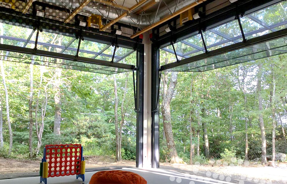Interior view of two open Schweiss glass bifold doors fitted on Blue Ridge Mountain Art Studio