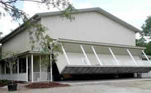 Hydraulic door opens up county building