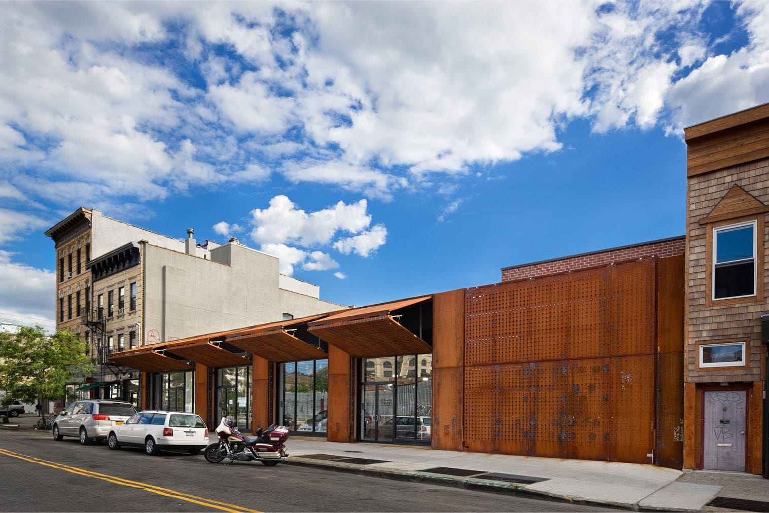 NYC warehouse get renovation including Schweiss Doors to create shopping center