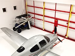 Insulated bifold hangar doors