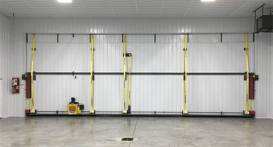 Schweiss bifold liftstrap door with serial number viewed from the inside