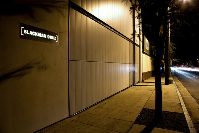 Custom bifold door for storefront in closed position