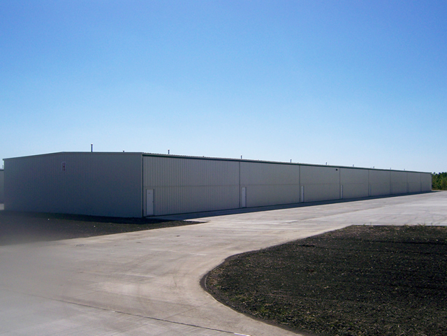 row of t-hangars with bifold doors