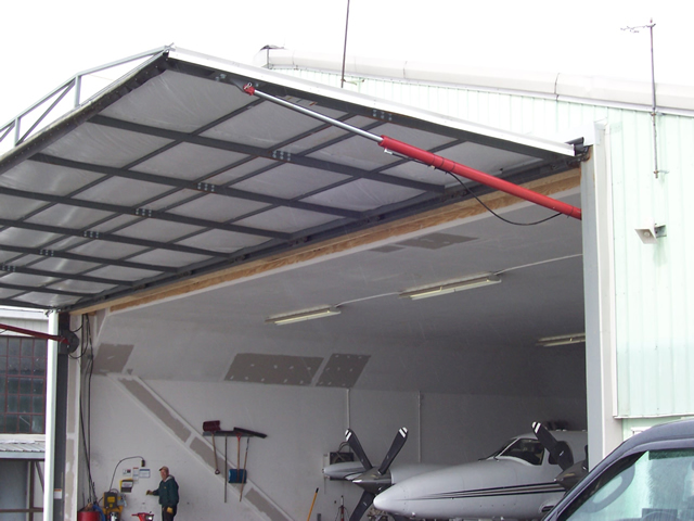 fully opened hydraulic hangar door