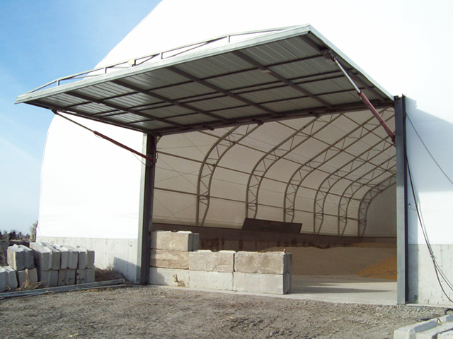 fully open hydraulic door on fabric building endwall