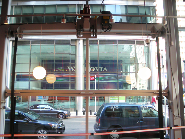 inside restaurant looking through glass covered bifold door