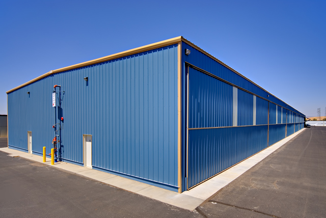 many bifold doors on steel t-hangar building