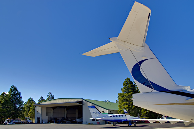 big bifold door on large steel building, aircraft hangar