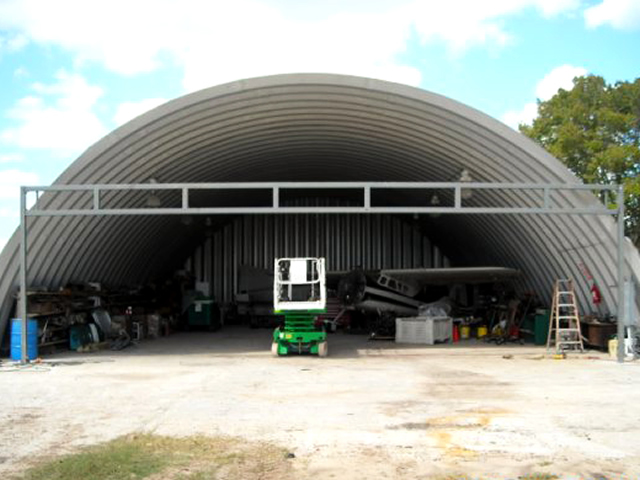 free standing header on quonset building
