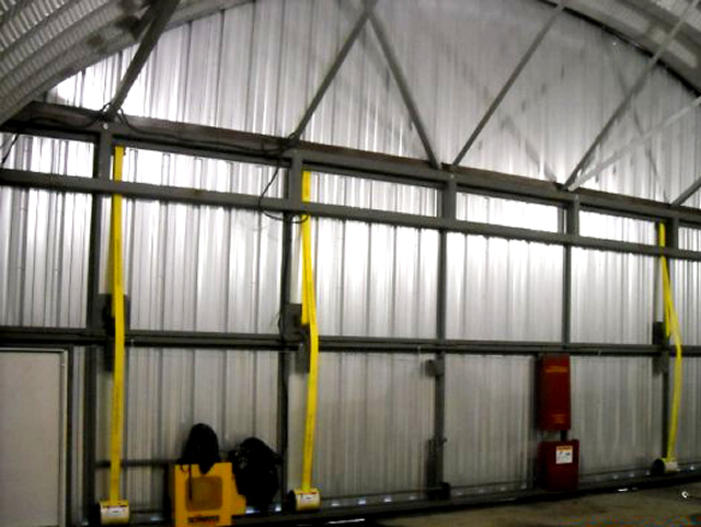 inside view of bifold door and free standing header on quonset building