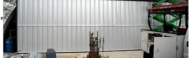 Schweiss door getting installed on quonset in Texas