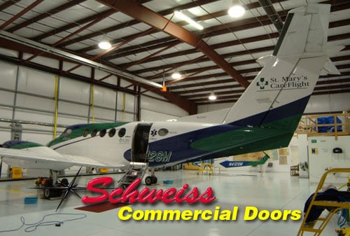 Commercial bifold Door on Airplane Hangar