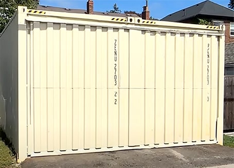 Schweiss bifold container door fitted on Jeffrey Veffer's shipping container garage shown closed