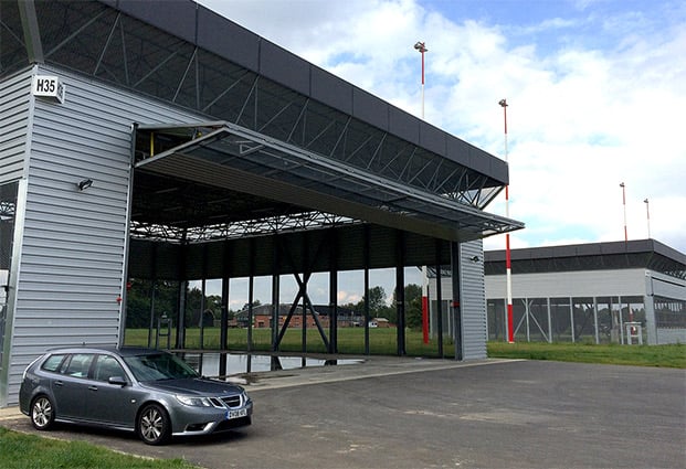 Bifold military doors where clad in mesh for ventilation