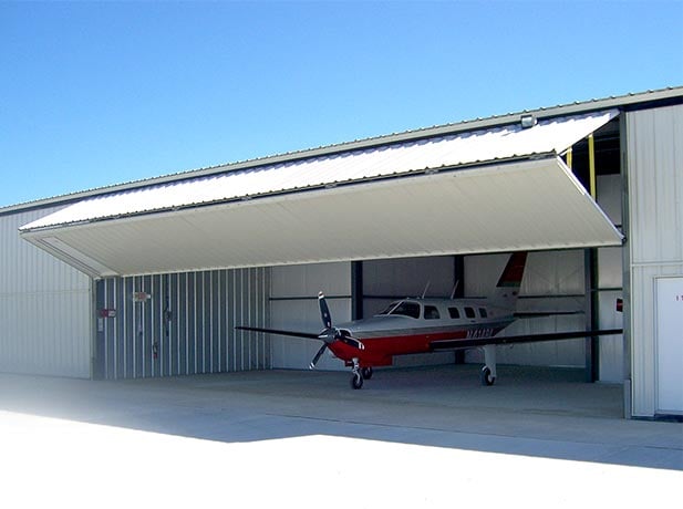 Bult Airfield installs +130 Schweiss doors on their hangars.