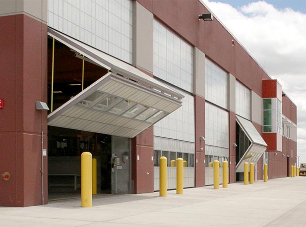 Doors provide lighting and panels that permit some visibility and shade to workers