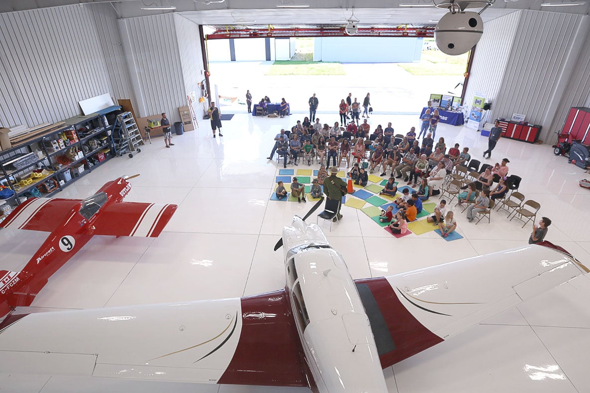 Schweiss door was installed on Canadian hangar for its great quality, and automatic strap latch system.