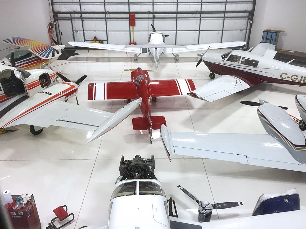 Fifty-seven foot Schweiss bifold door installed on large hanger at Villeneuve Airport