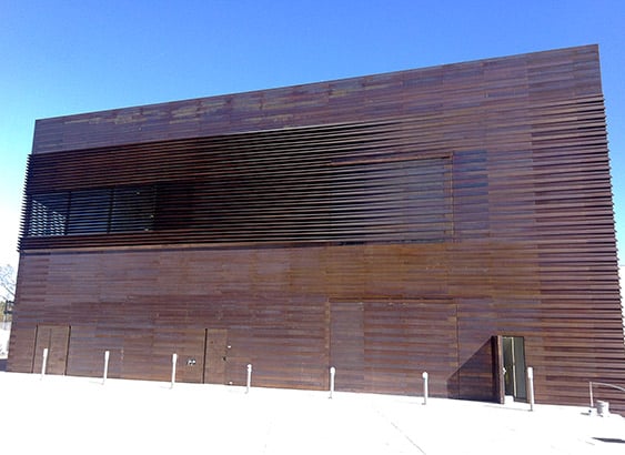 Custom-made One-Piece hydraulic door hides into the side of Hall of Fame