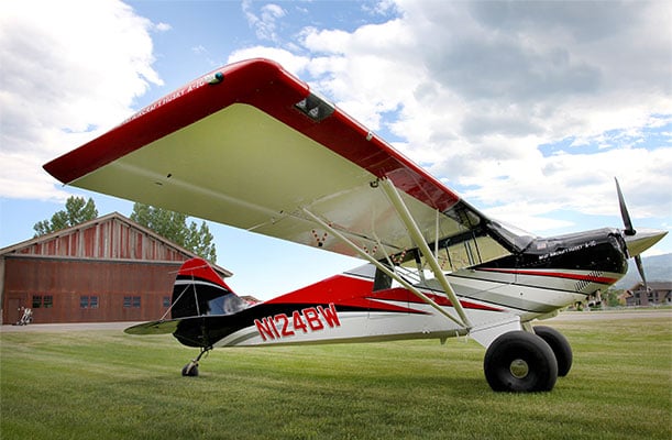 Husky A-1C and Schweiss door in Alpine Airpark are a part of air adventure flights