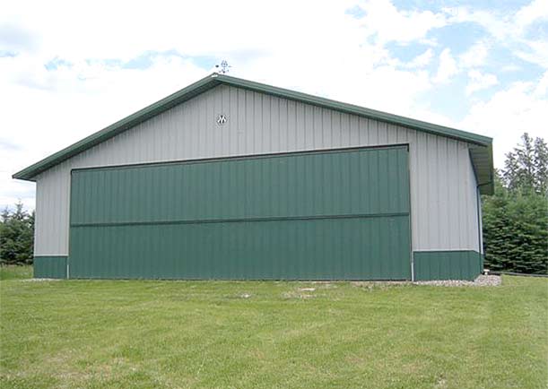 Schweiss Hydraulic Door was bought to avoid airport hangar rentals.