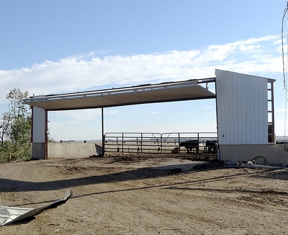 Schweiss bifold door at ends of survives tornado in Washta, IA