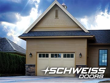 Bifold Designer RV Garage Door has seamless look with matching siding of garage