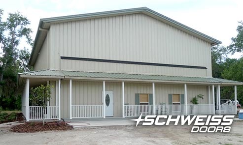 Florida hangar home with hydraulic door / porch