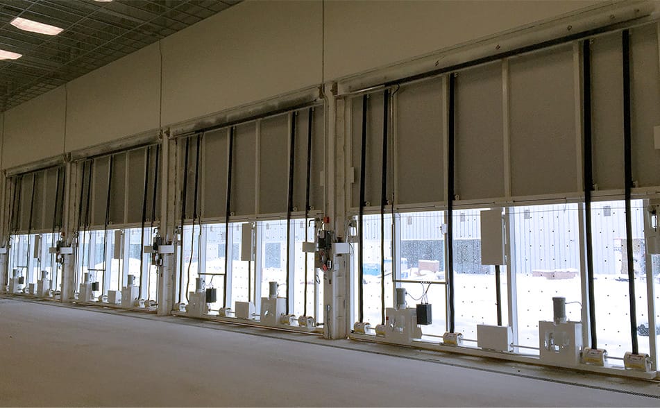 nterior view of multiple custom Schweiss glass bifold doors installed at a Canadian Forces Base in Ontario