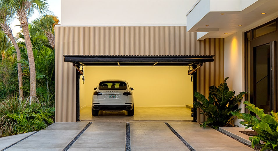 Hidden Schweiss hydraulic designer door installed on Barake designer home shown open