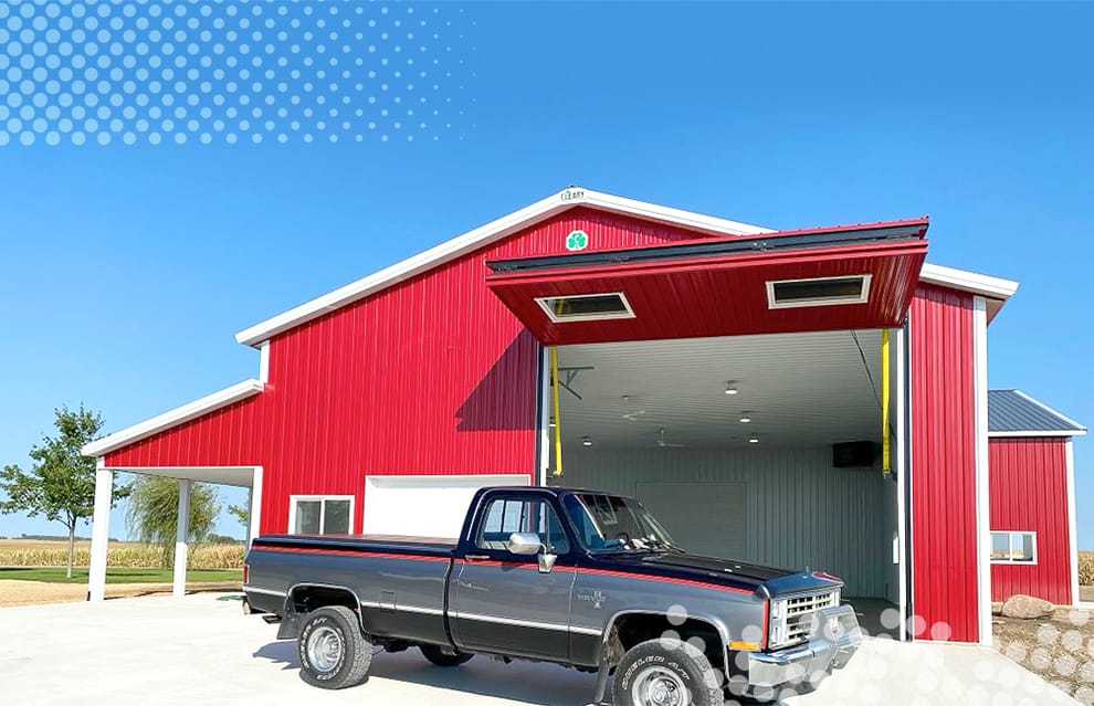 View of Schweiss bifold door installed on Craig Beranek's shop shown in the open position