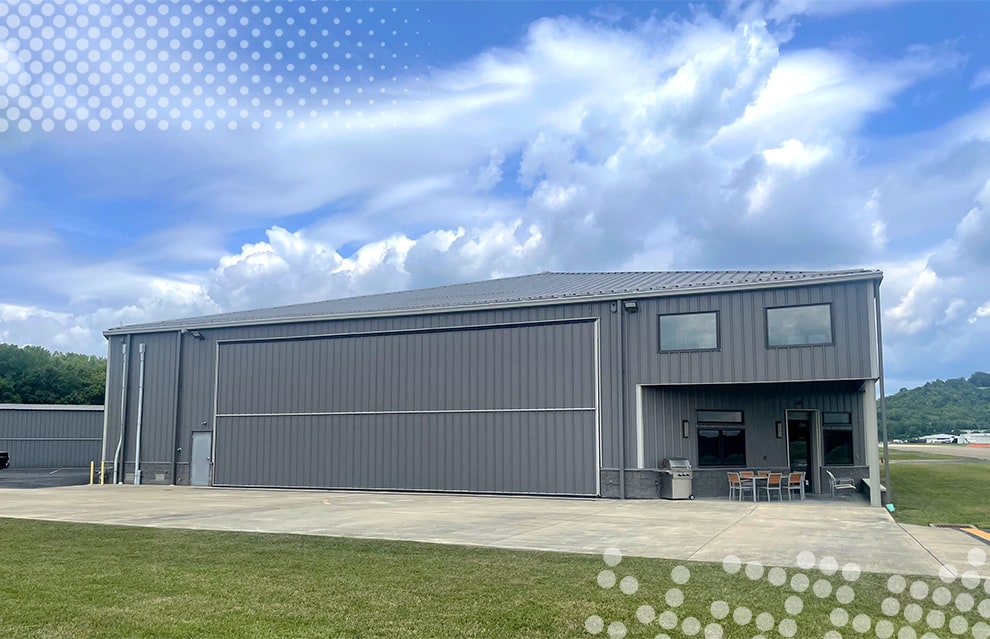 Schweiss bifold door installed on the backside of hangar owned by Brad Mottier