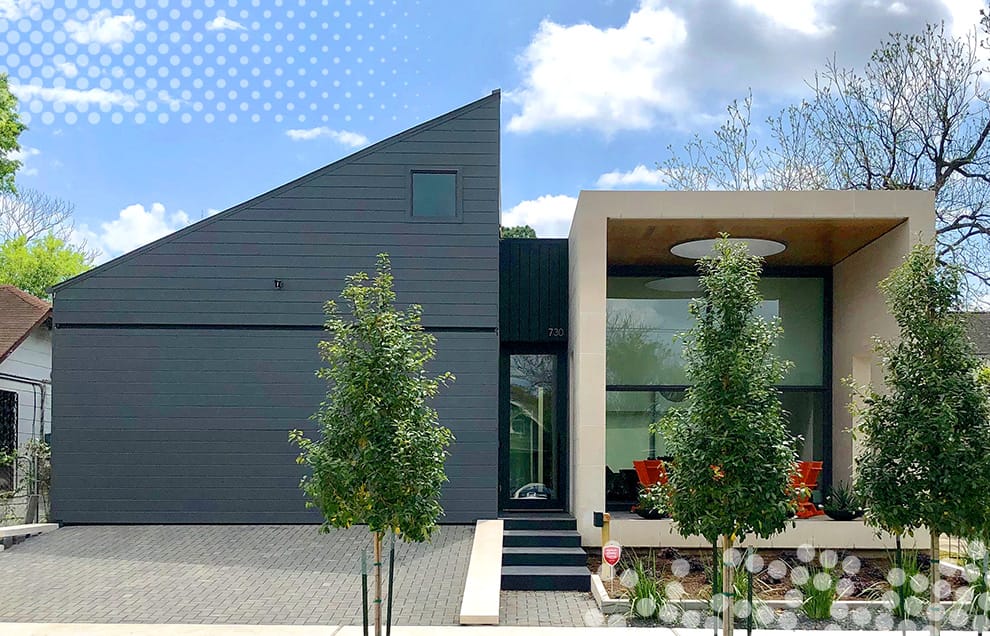 View of Wayne Braun's home with custom Schweiss bifold door fitted on the garage