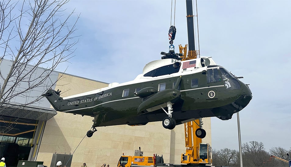 Iconic helicopter Marine One being unloaded from transit truck trailer at George H.W. Bush Presidential Library and Museum