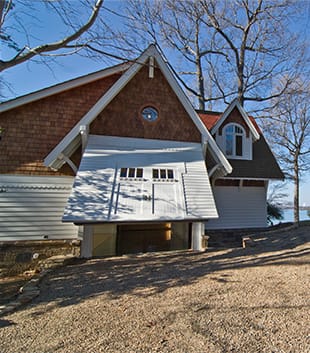 Schweiss hydraulic door on Carriage House shown opening