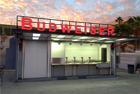 Schweiss hydraulic door fitted on grounded Budweiser service container