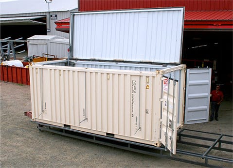 Schweiss hydraulic door fitted on a storage container acting as a opening roofr