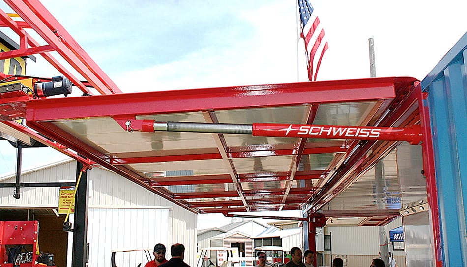 Side view of Schweiss hydraulic door installed on a storage container