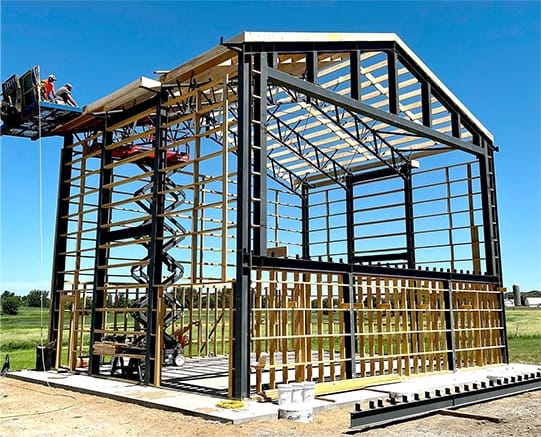 Angled view of the frame for the Drive-In Church during its construction