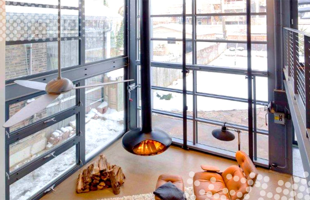 Interior view of Schweiss bifold door fitted on renovated home by dSpace Studios shown closed