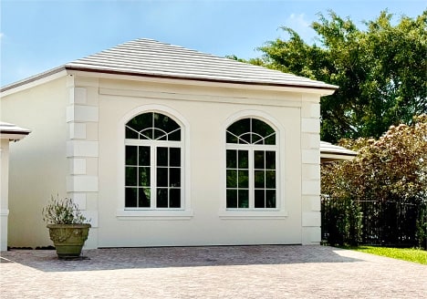 Exterior view from left of hidden Schweiss hydraulic door shown closed on Frank Vital's RV garage in Fort Lauderdale