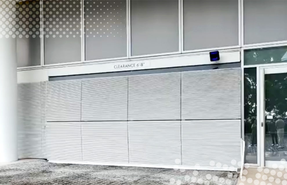 Schweiss bifold door installed on parking garage at Four Seasons Hotel Miami shown closed
