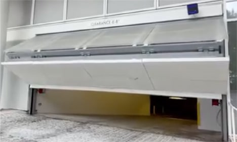 Schweiss bifold door installed on parking garage at Four Seasons Hotel Miami shown open